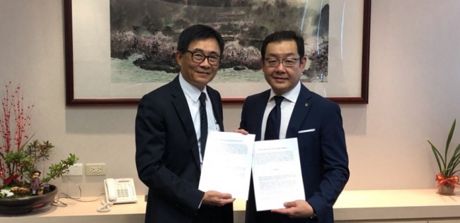 （左から顔 政雄、栗田 英人）